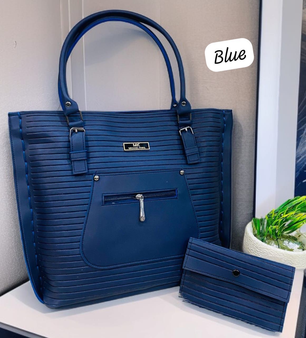 Michael Kore Tote Bag